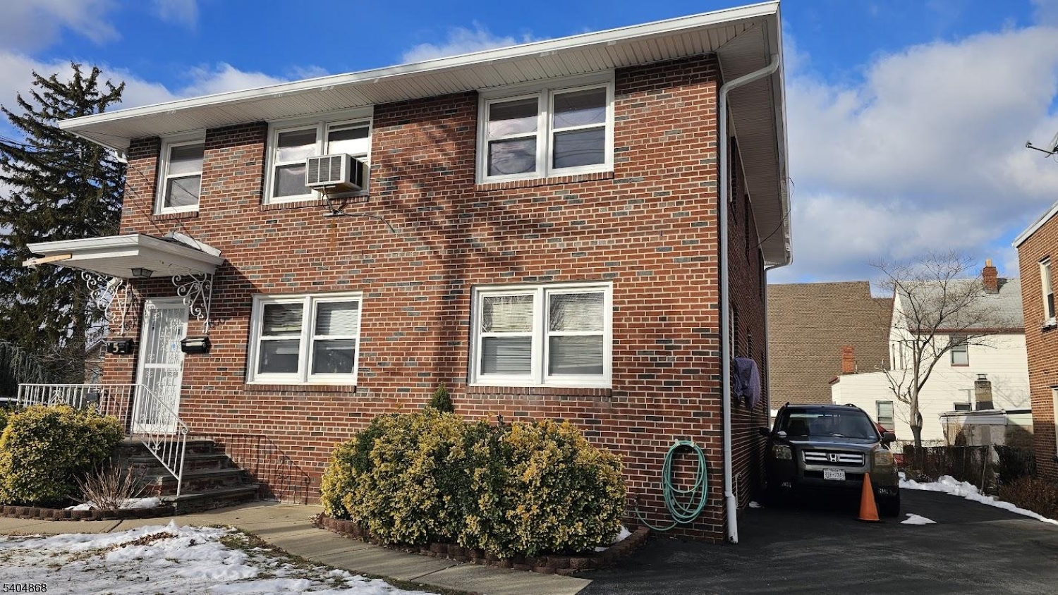5 Passaic Avenue Nutley, NJ 07110 - Photo 12 of 12 a front view of a house with garden