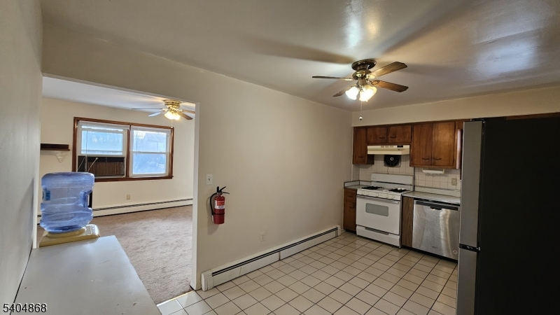 5 Passaic Avenue Nutley, NJ 07110 - Photo 6 of 12 a view of kitchen with sink refrigerator and window