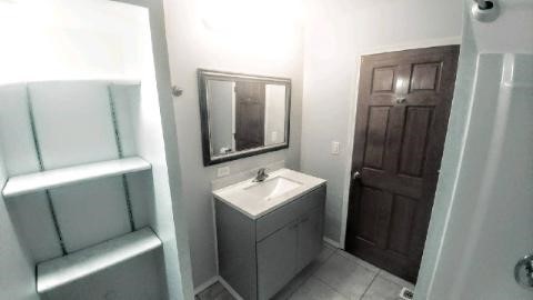 2 Tower Court Downers Grove, IL 60516 - Photo 10 of 20 a bathroom with a sink toilet and mirror