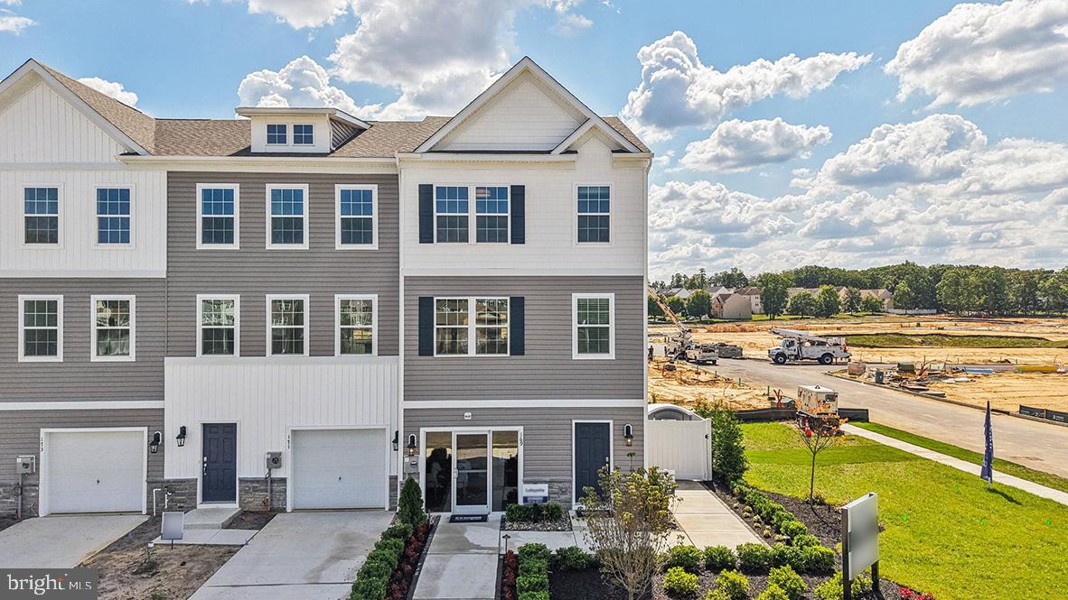 127 Gary Way Sicklerville, NJ 08081 - Photo 3 of 60 a view of a lake with a building in the background