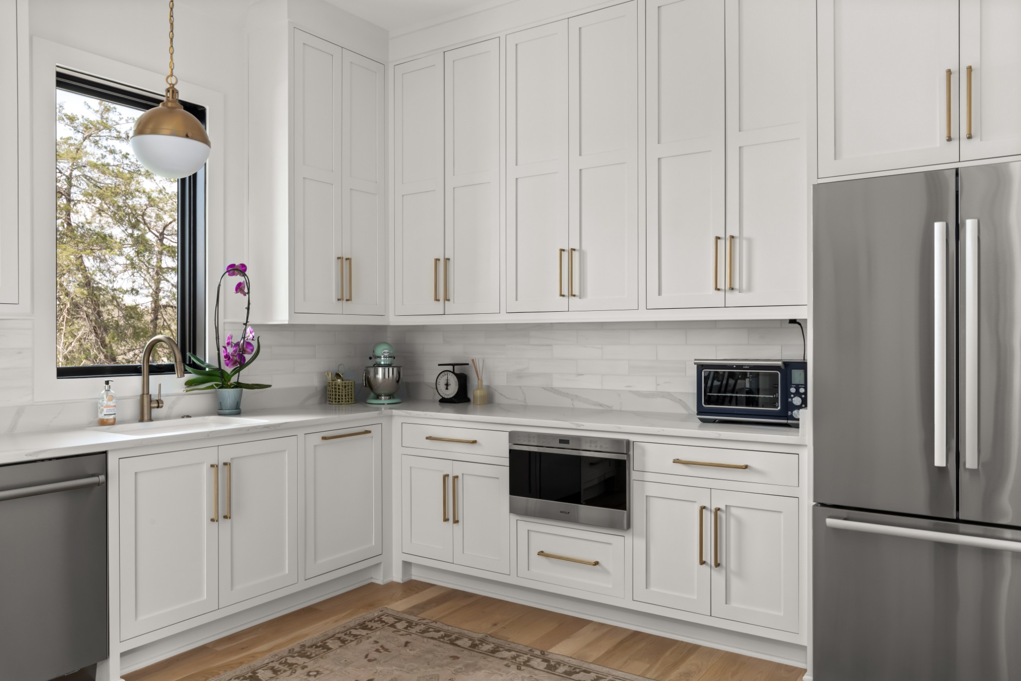 4472 South Carothers Road Franklin, TN 37064 - Photo 14 of 44 a kitchen with white cabinets sink and white appliances