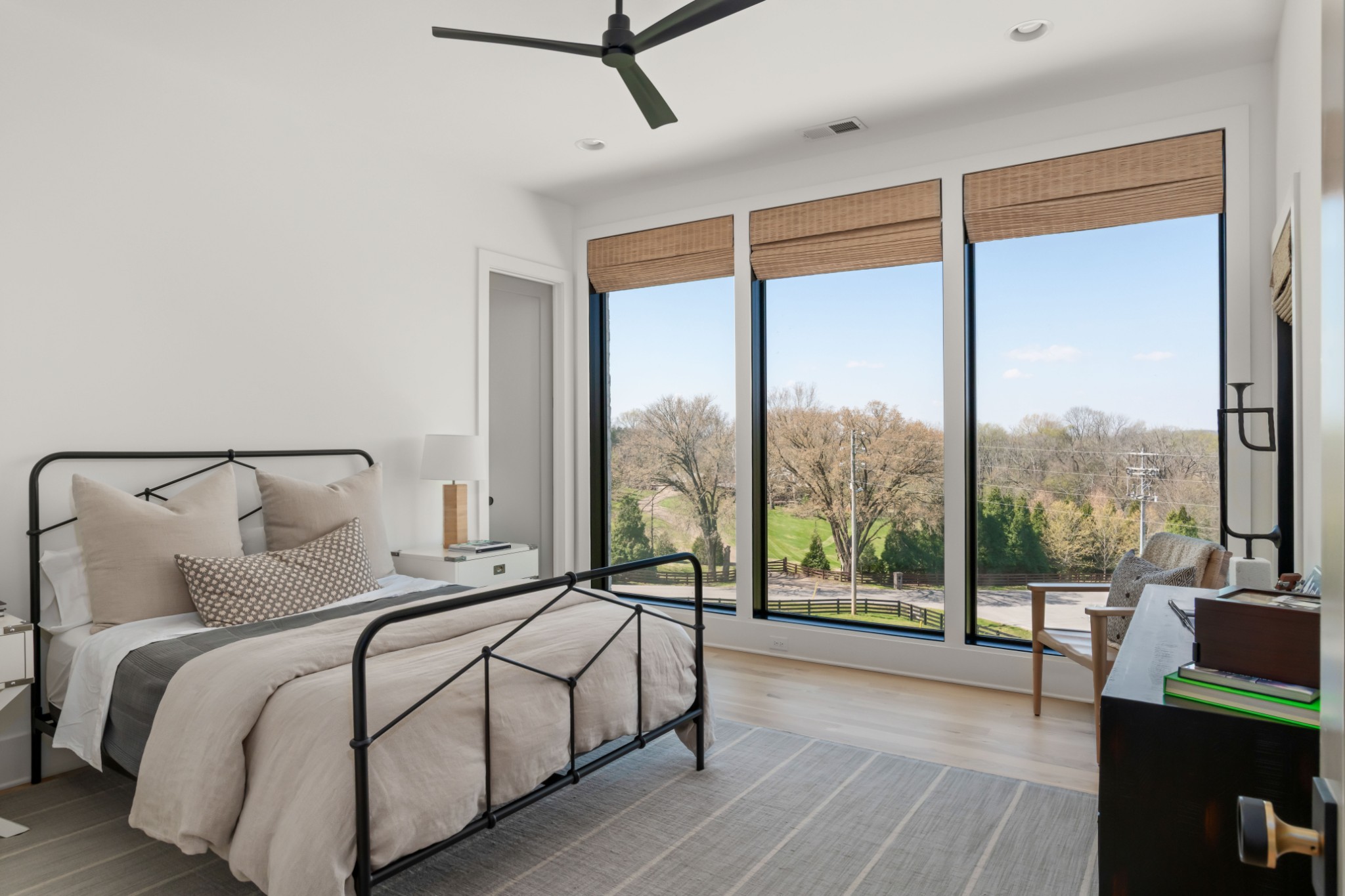 4472 South Carothers Road Franklin, TN 37064 - Photo 23 of 44 a bedroom with a large bed and a balcony view