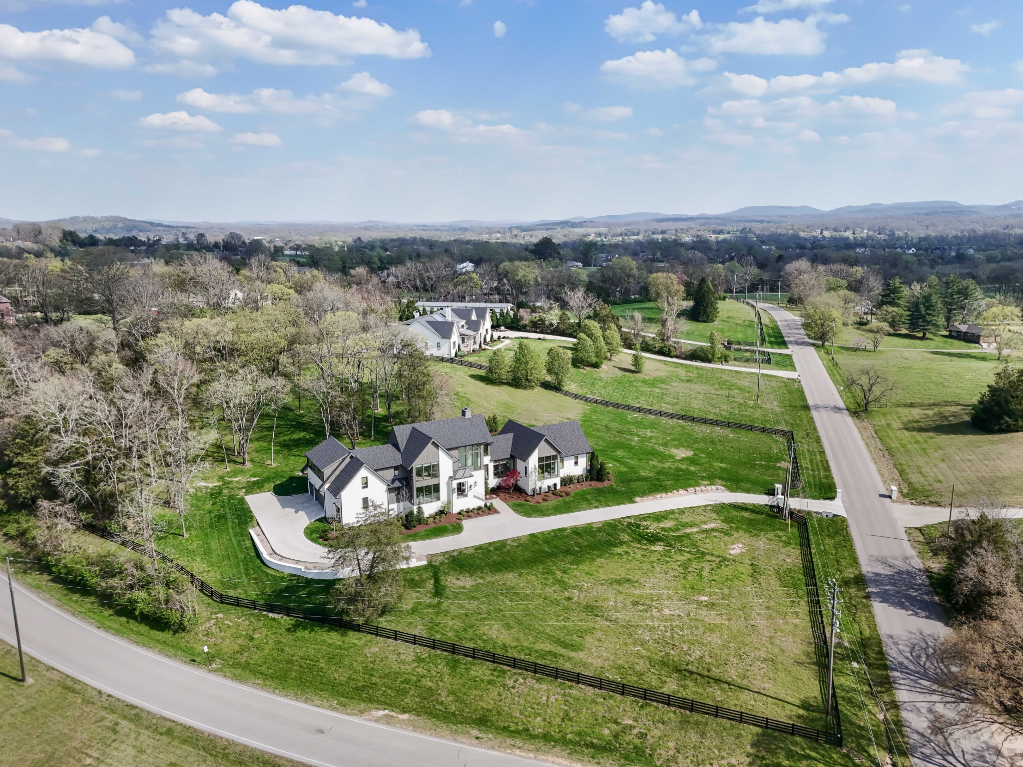4472 South Carothers Road Franklin, TN 37064 - Photo 39 of 44 an aerial view of a house with a yard