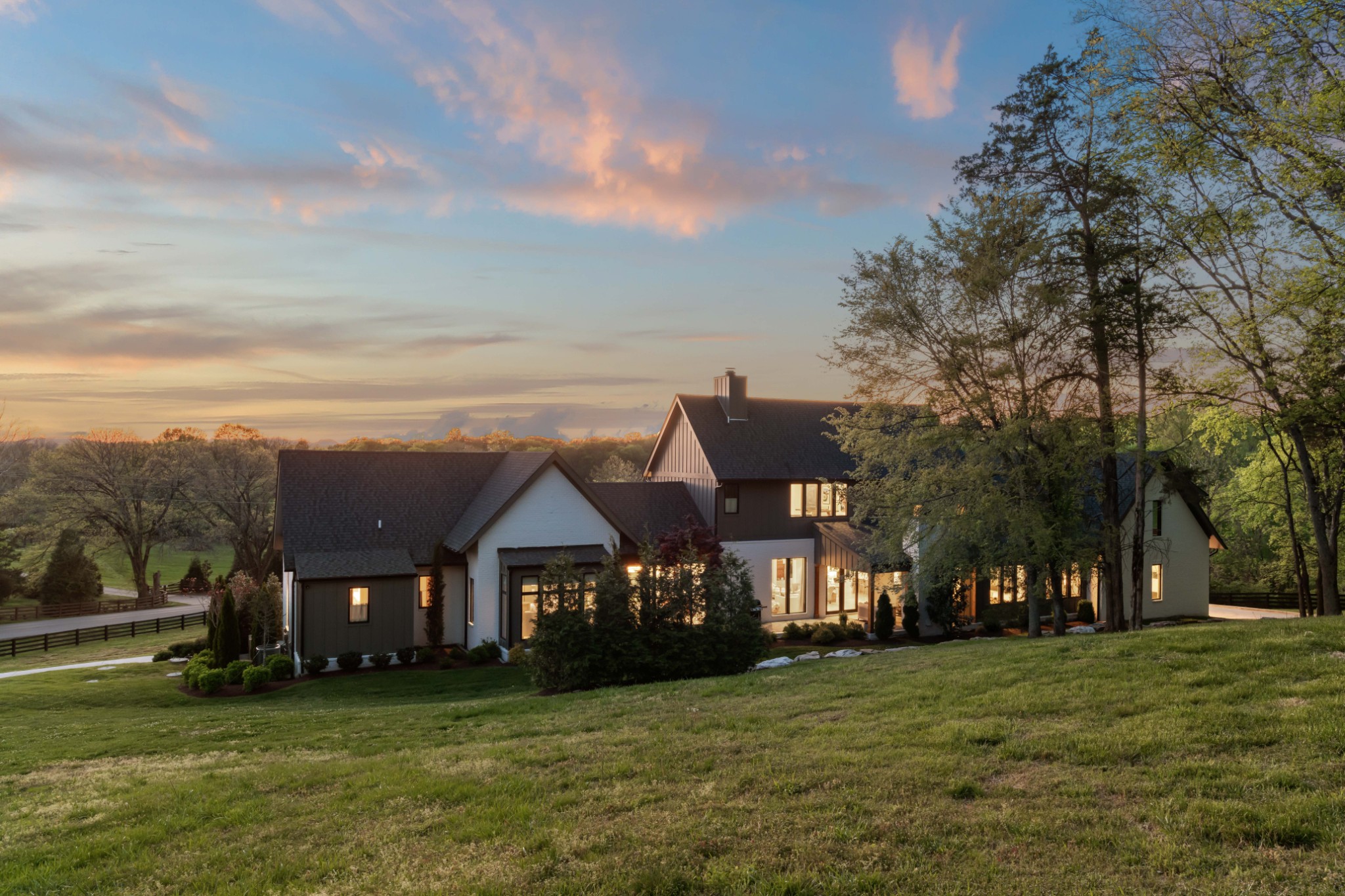 4472 South Carothers Road Franklin, TN 37064 - Photo 41 of 44 a view of a big house with a big yard and large trees