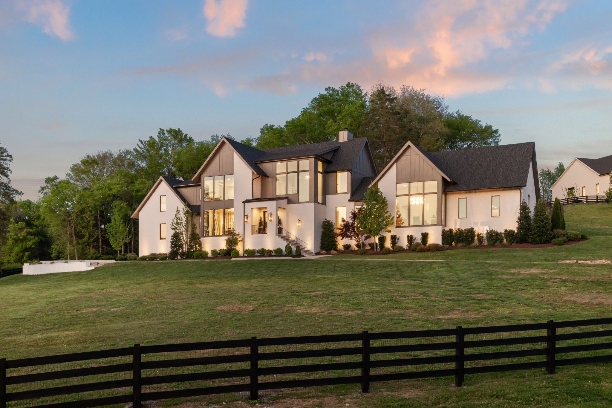 4472 South Carothers Road Franklin, TN 37064 - Photo 42 of 44 a view of a big house with a big yard and potted plants