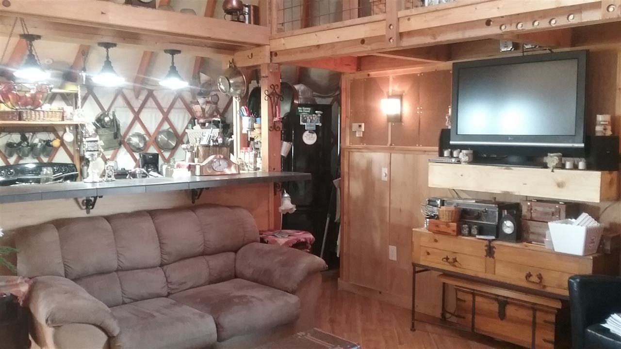 1448 20 Road Fruita, CO 81521 - Photo 4 of 20 a living room with furniture and a flat screen tv