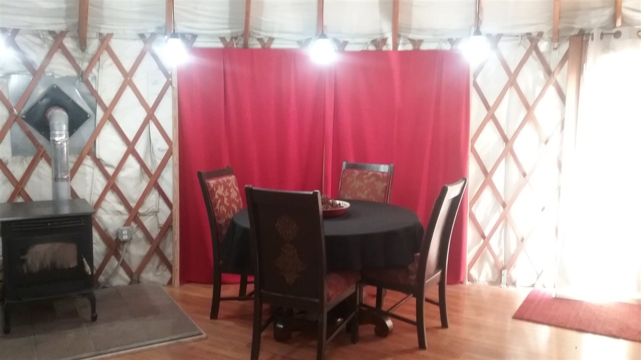 1448 20 Road Fruita, CO 81521 - Photo 9 of 20 a view of a dining room with furniture and wooden floor