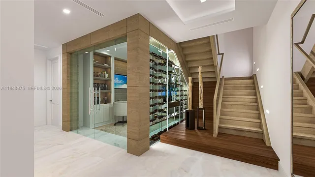 a view of entryway with wooden floor and stairs