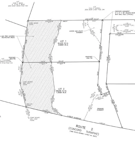 a picture of a room with a white wall and a picture of a white house