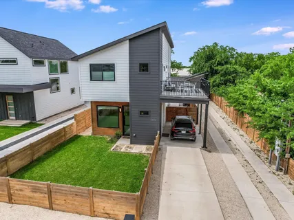 a view of a patio with wooden floor