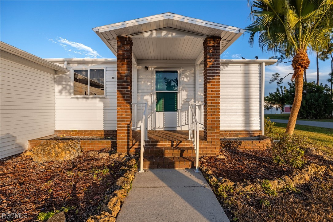 19658 Eagle Trace Court North Fort Myers, FL 33903 - Photo 2 of 40 a front view of a house with garden