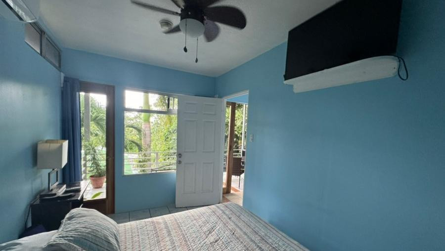 Undisclosed Address undefined, undefined 00000 - Photo 12 of 35 a bedroom with a bed and a window