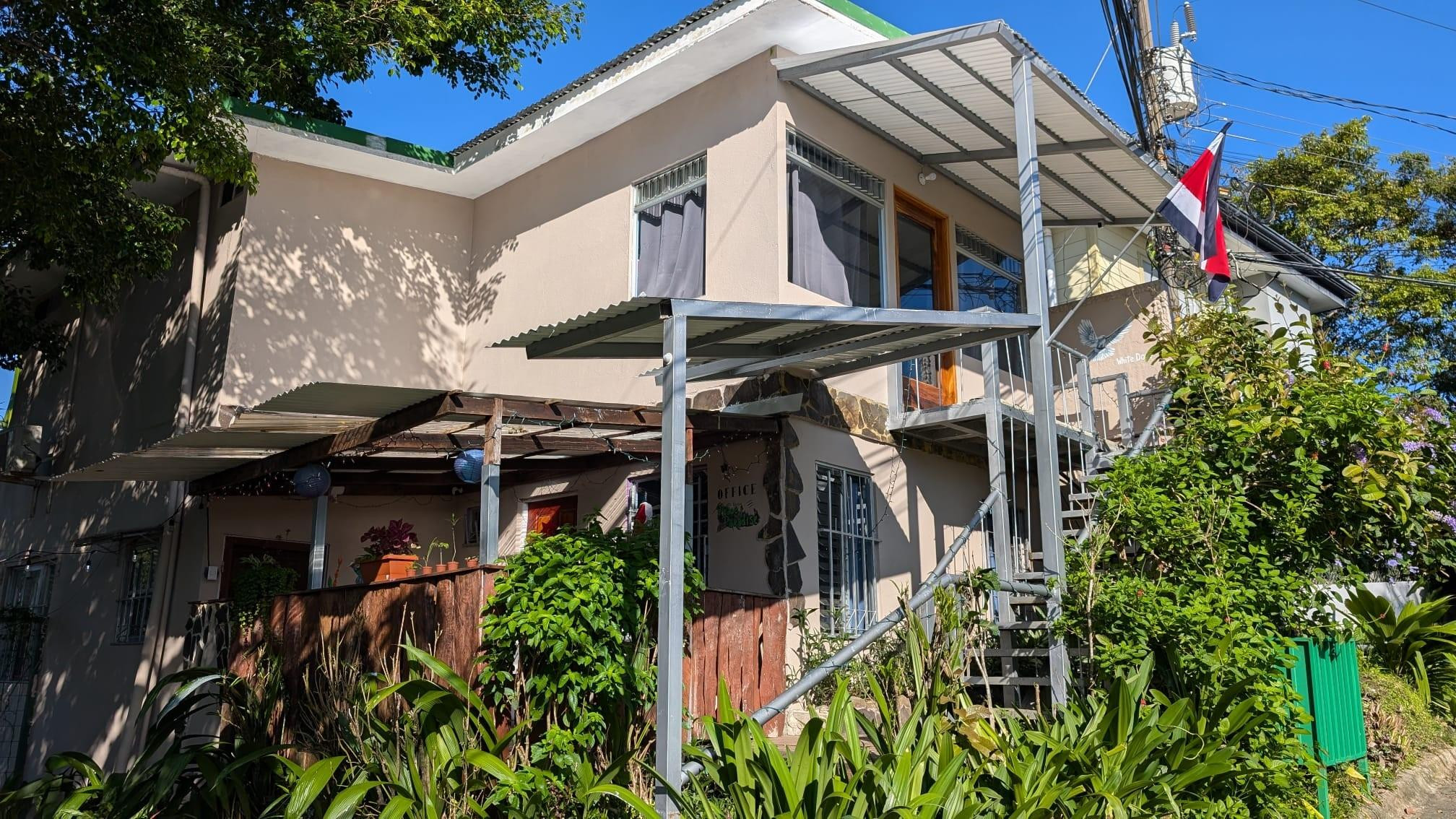 Undisclosed Address undefined, undefined 00000 - Photo 5 of 35 a view of a house with plants and flowers