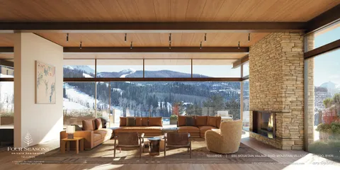 a view of a patio with a table and chairs