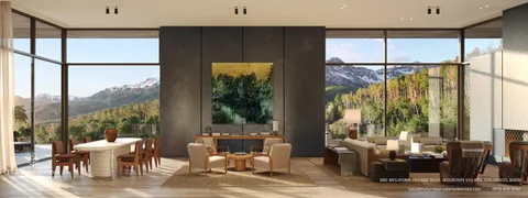 a dining room with furniture window and outside view