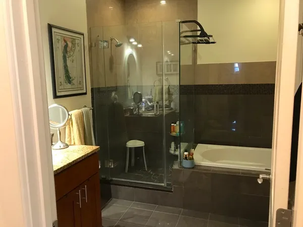 a bathroom with a bathtub and a sink