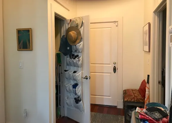 a bathroom with a shower and a mirror