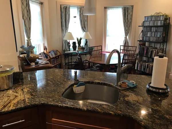 a view of a living room with furniture