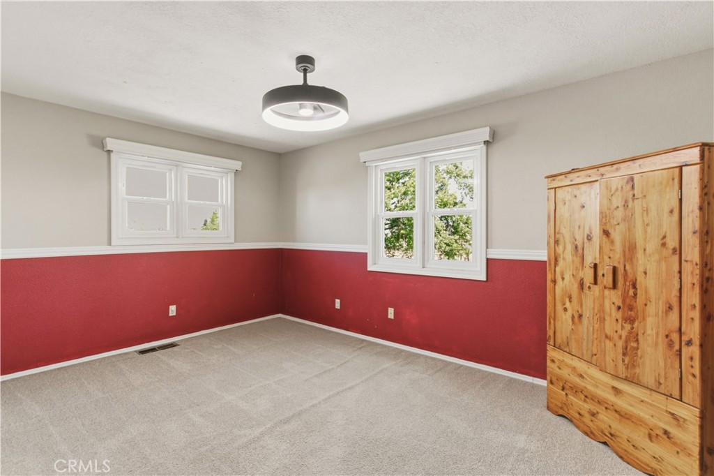 3856 North Gardner Avenue Merced, CA 95340 - Photo 34 of 59 an empty room with windows and closet