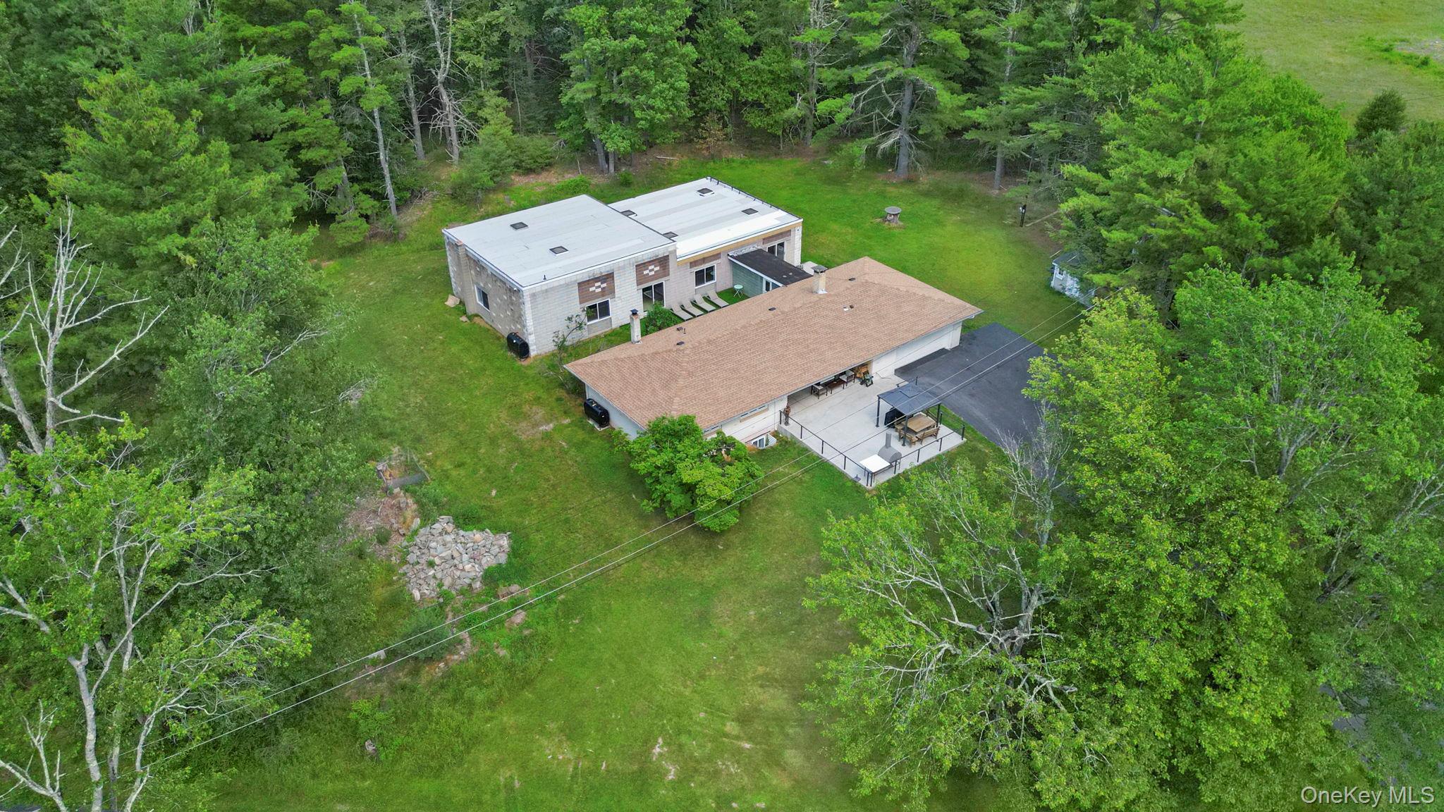 35 Kroeger Road Monticello, NY 12701 - Photo 1 of 29 an aerial view of a house with yard and outdoor space