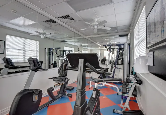 a view of a room with gym equipment