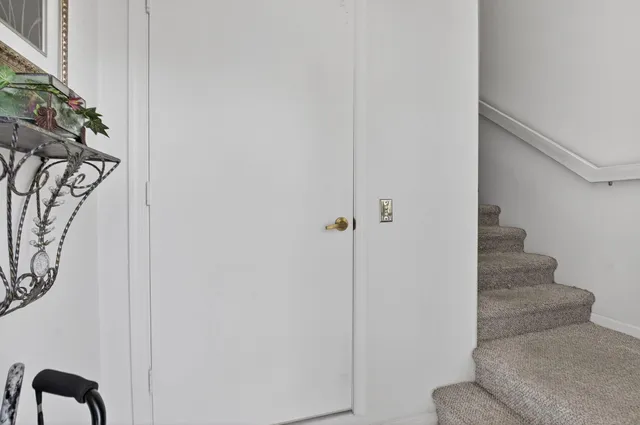 a view of entryway with stairs