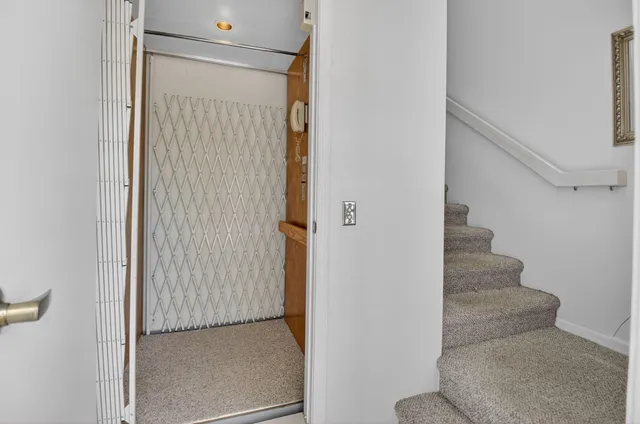 a view of entryway with stairs