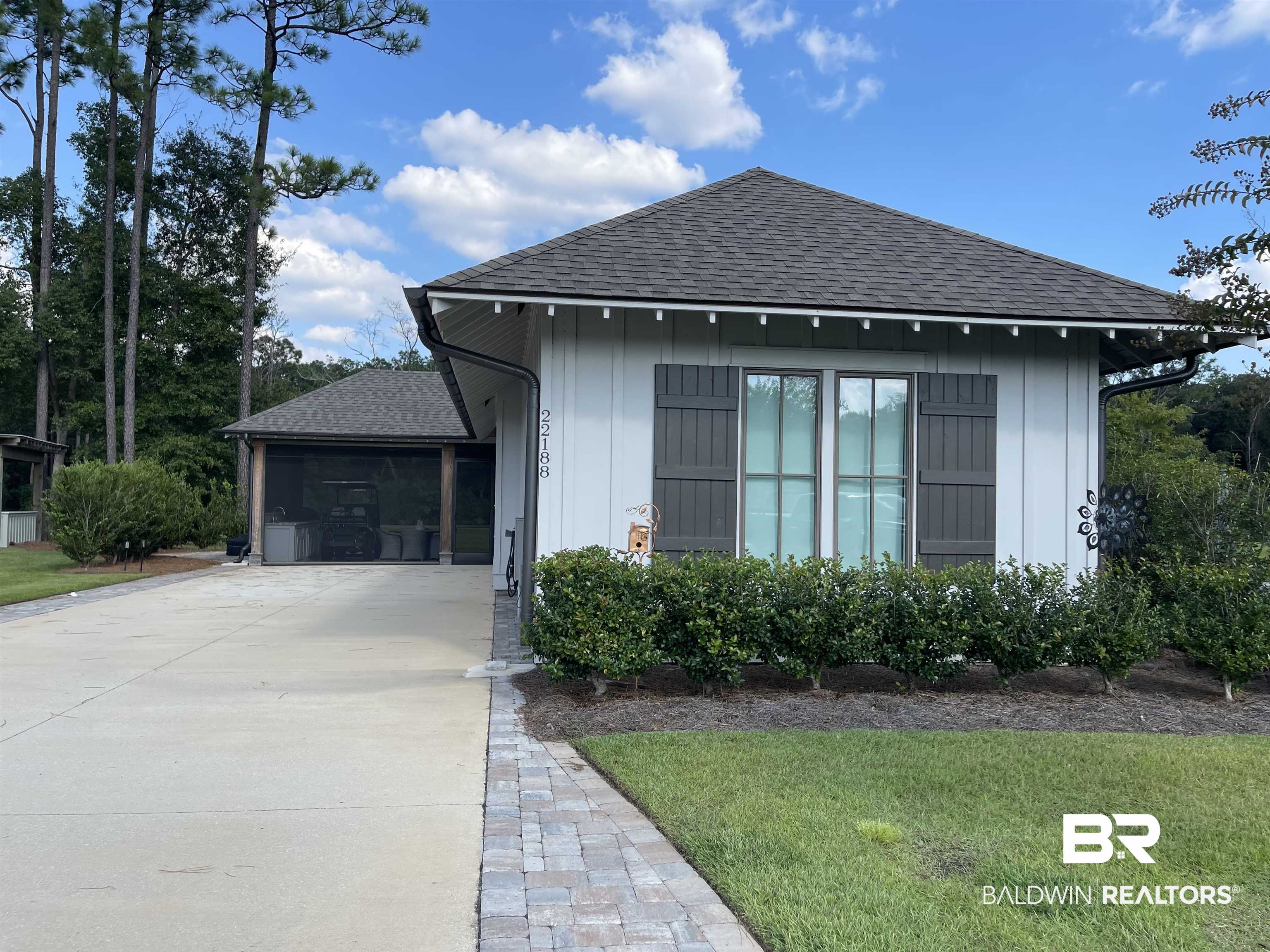 6 Fairhope Motorcoach Loop Fairhope, AL 36532 - Photo 2 of 33 View of front facade with a garage and a front lawn