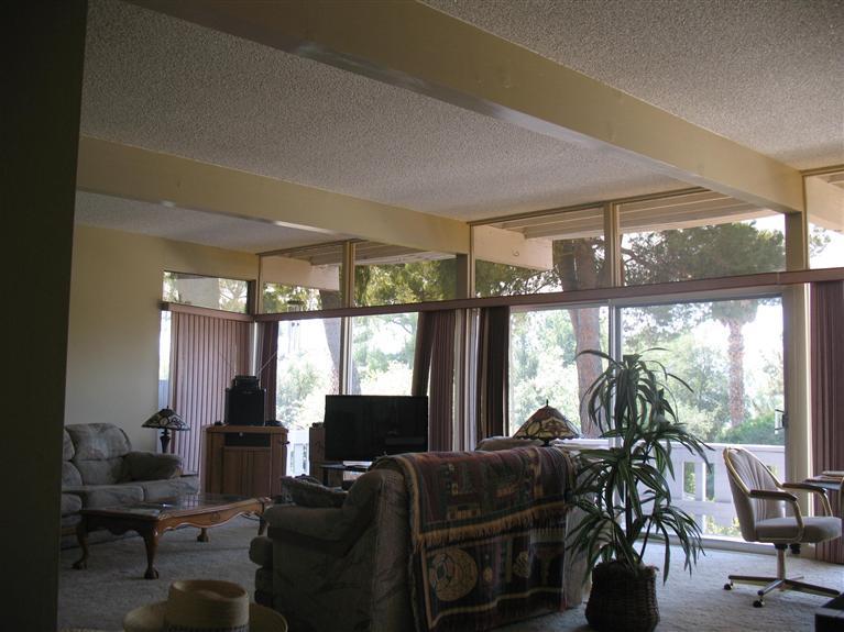2510 Ladera Road Ojai, CA 93023 - Photo 12 of 15 a living room with furniture and large windows
