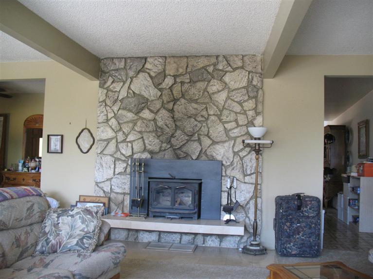 2510 Ladera Road Ojai, CA 93023 - Photo 13 of 15 a living room with furniture and a fireplace