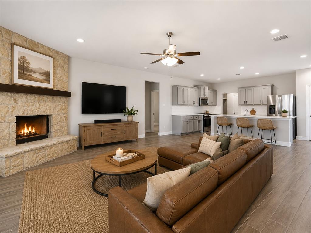 1601 Radecke Road Krum, TX 76249 - Photo 12 of 36 Spacious open-concept interior featuring light wood-finish flooring