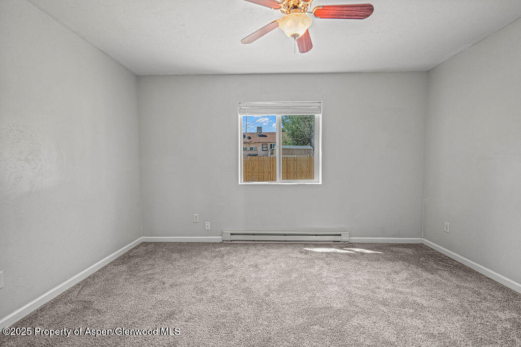 627 Lake Street Rangely, CO 81648 - Photo 29 of 44 an empty room with a window