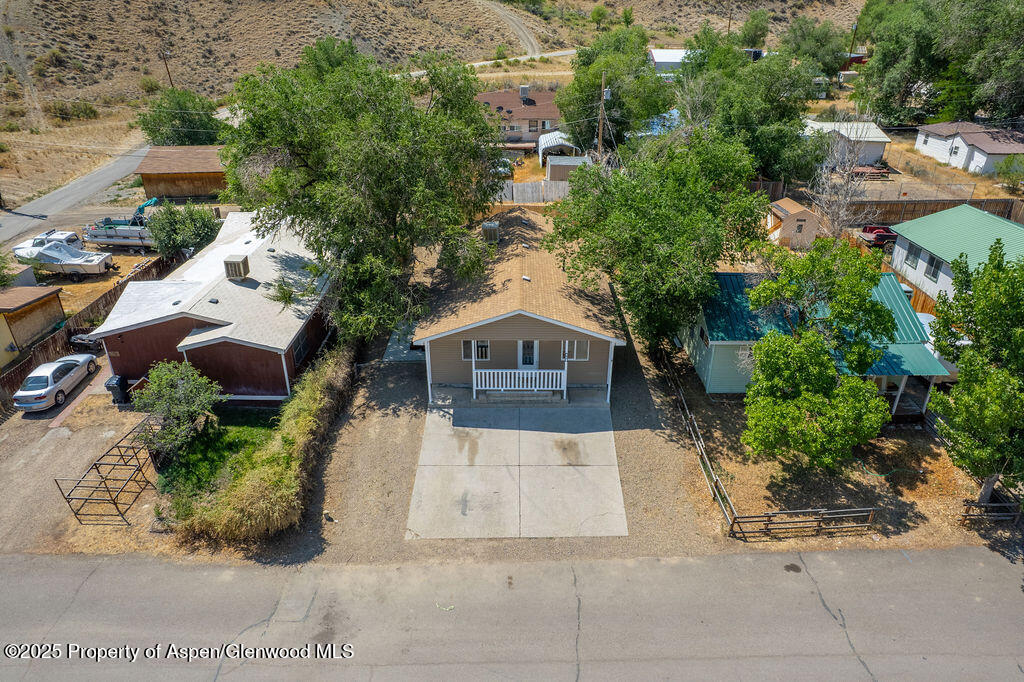 627 Lake Street Rangely, CO 81648 - Photo 44 of 44 an aerial view of a house with a yard