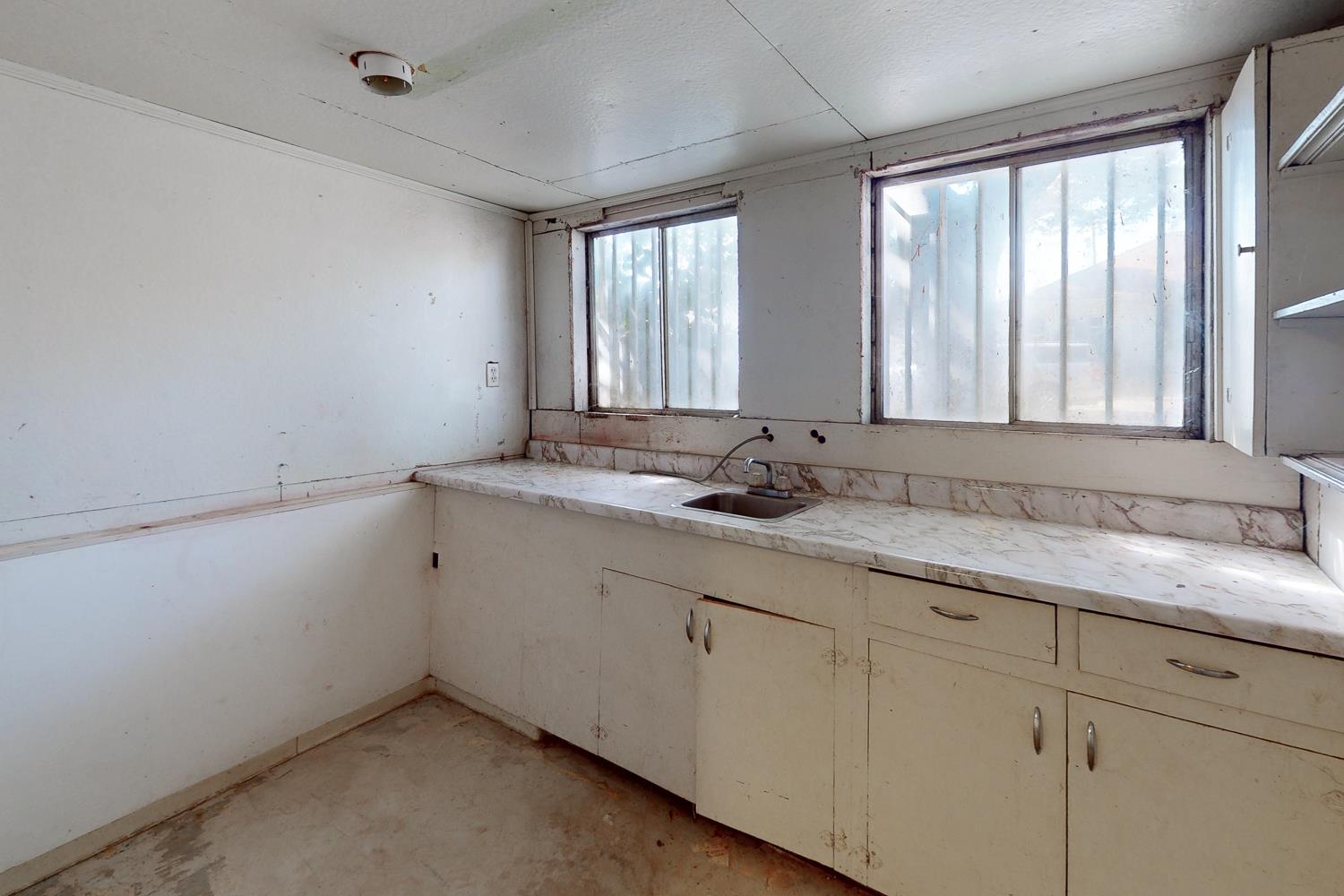 1585 Sycamore Street Gridley, CA 95948 - Photo 37 of 69 a bathroom with a sink and a window