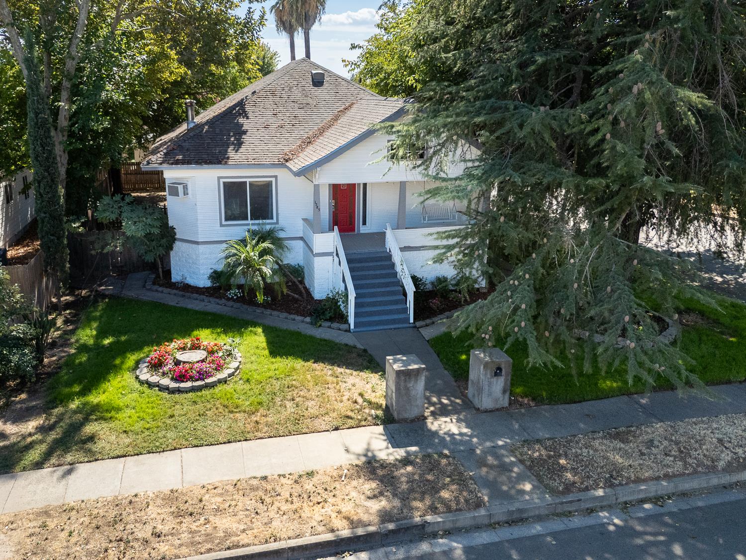 1585 Sycamore Street Gridley, CA 95948 - Photo 43 of 69 a front view of house with yard and green space