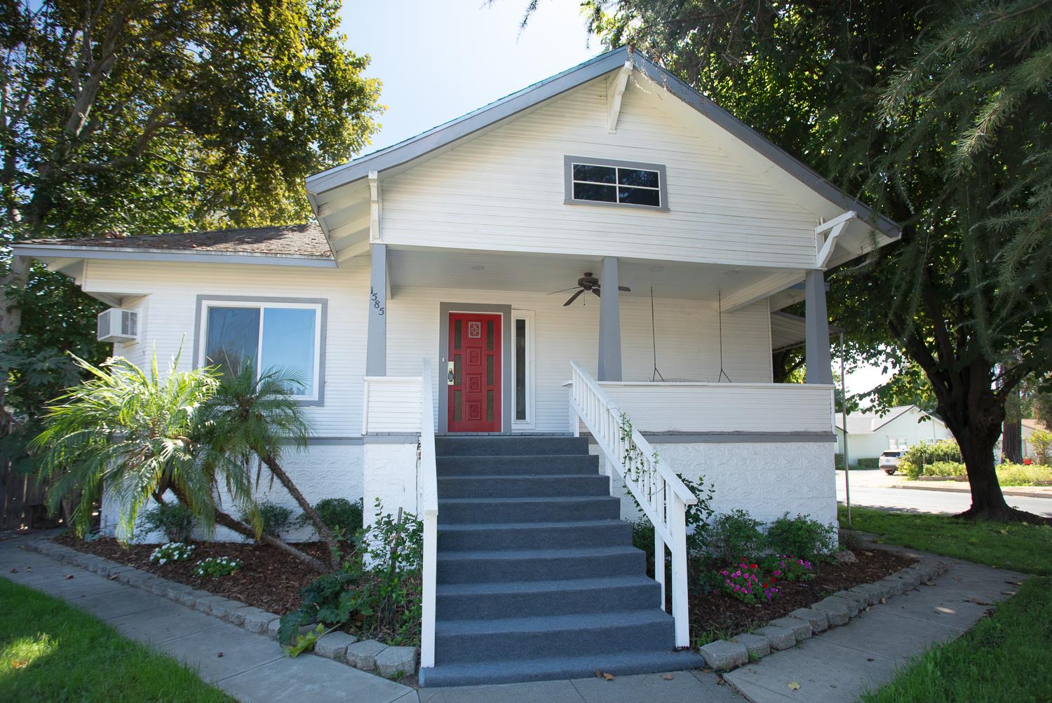 1585 Sycamore Street Gridley, CA 95948 - Photo 49 of 69 a view of a house with many windows and plants