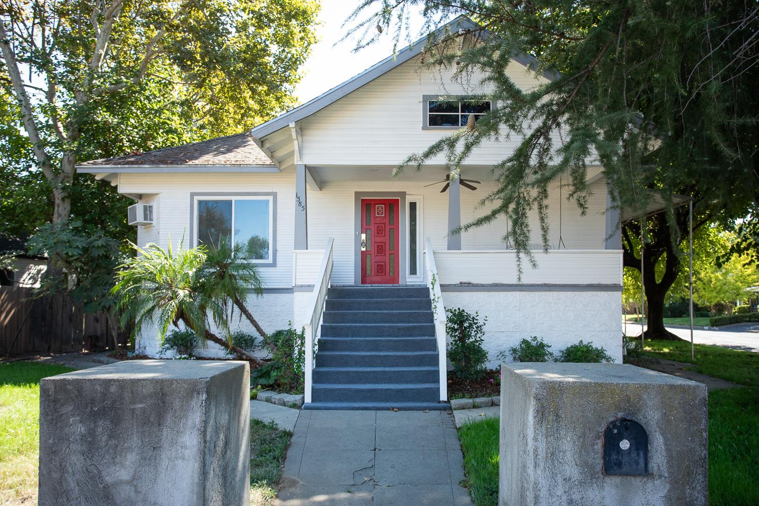 1585 Sycamore Street Gridley, CA 95948 - Photo 50 of 69 a front view of a house with a garden