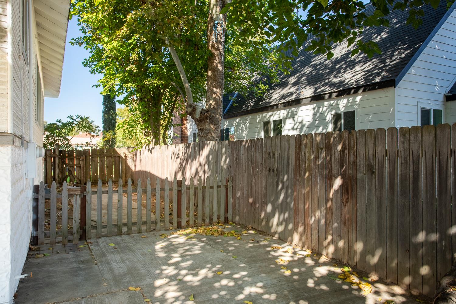 1585 Sycamore Street Gridley, CA 95948 - Photo 53 of 69 a view of backyard with wooden fence