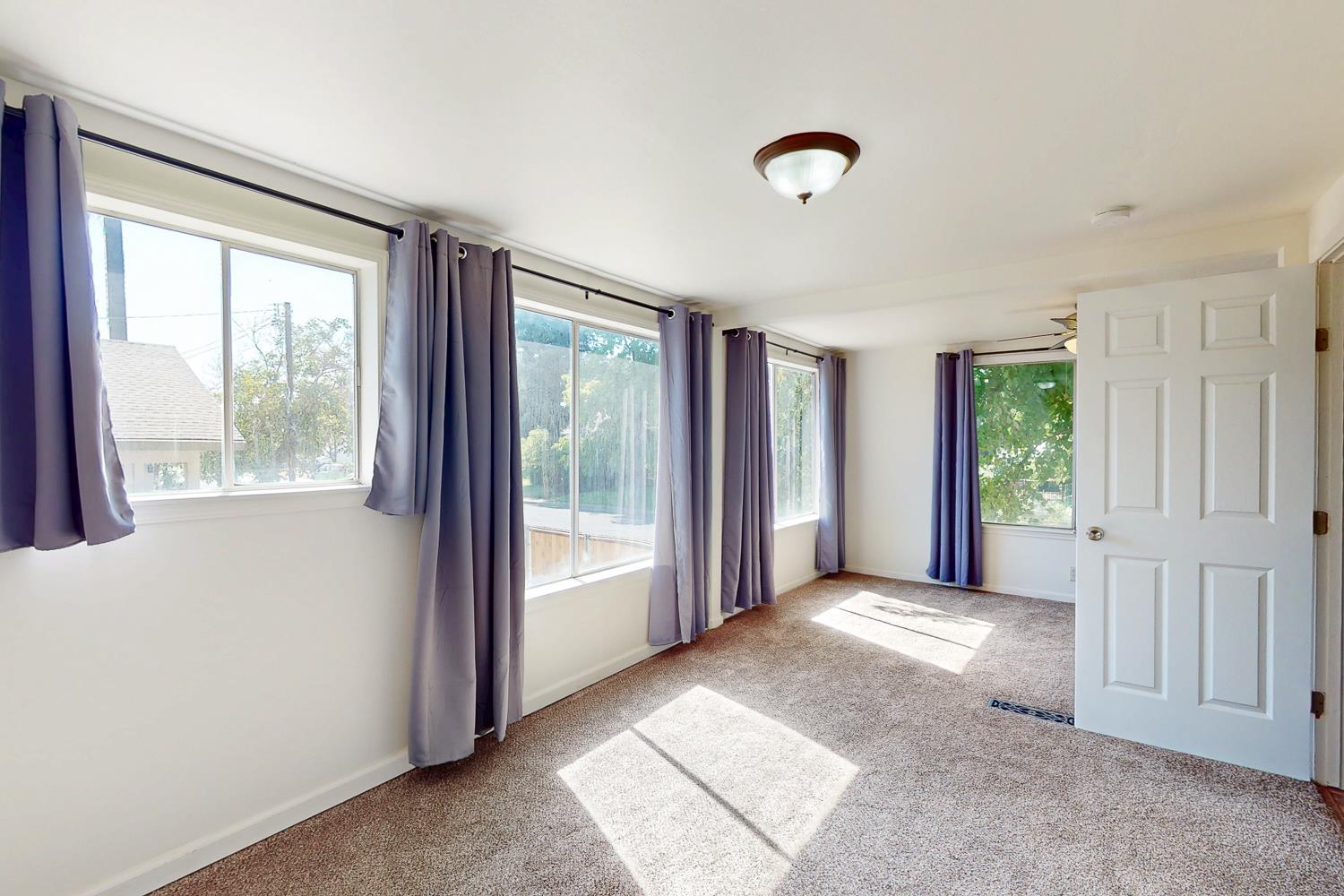 1585 Sycamore Street Gridley, CA 95948 - Photo 6 of 69 a view of a livingroom with a staircase