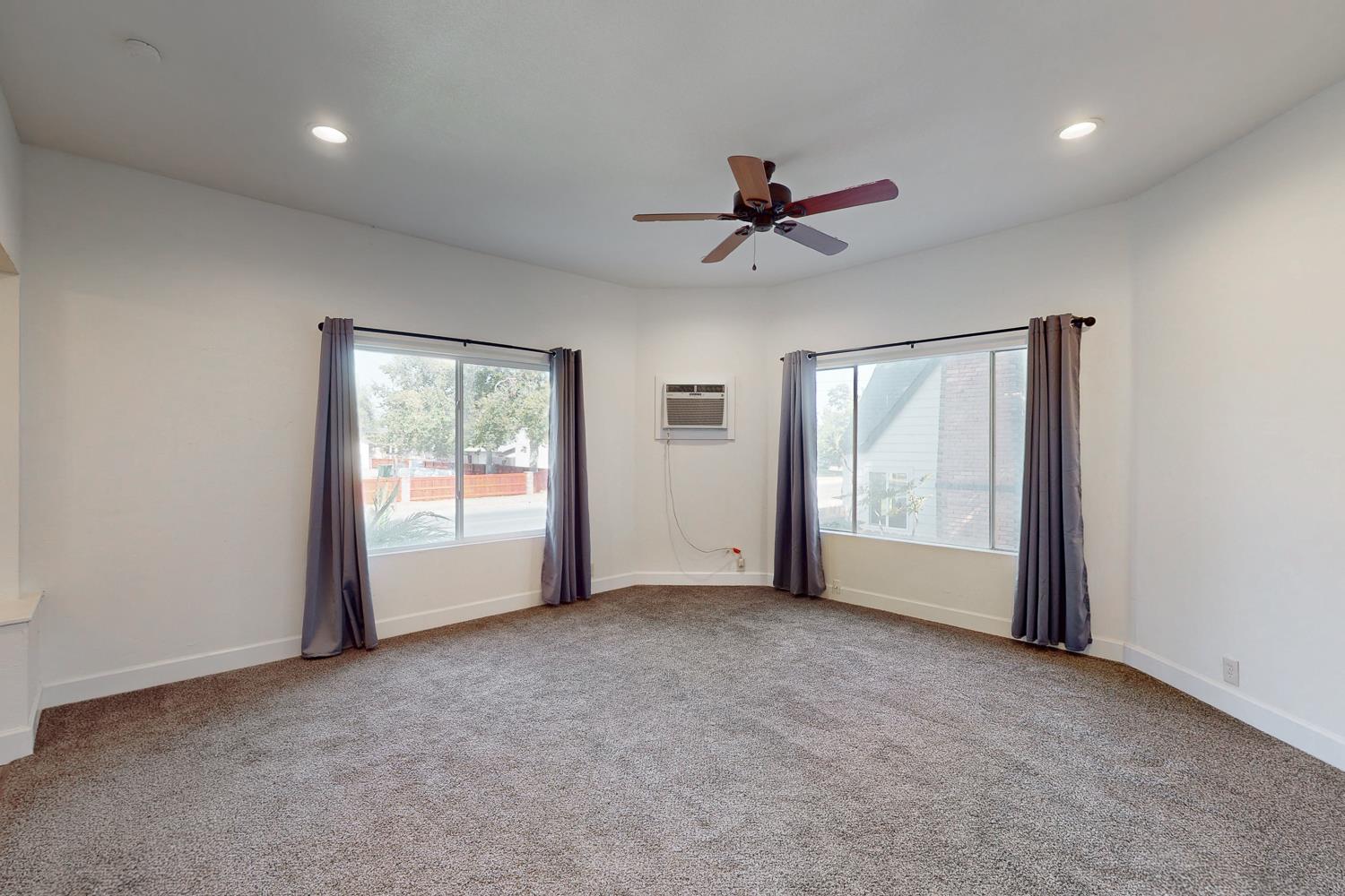 1585 Sycamore Street Gridley, CA 95948 - Photo 9 of 69 a view of empty room with windows