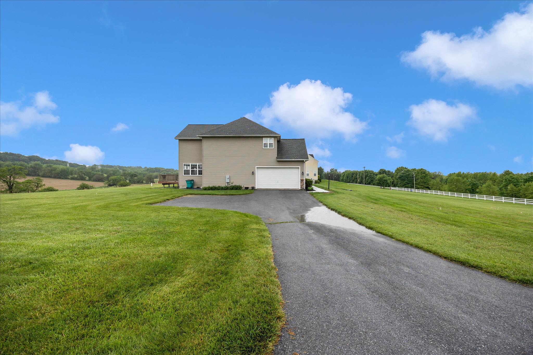 9855 McKinstry Mill Road New Windsor, MD 21776 - Photo 55 of 76 a view of a house with a yard