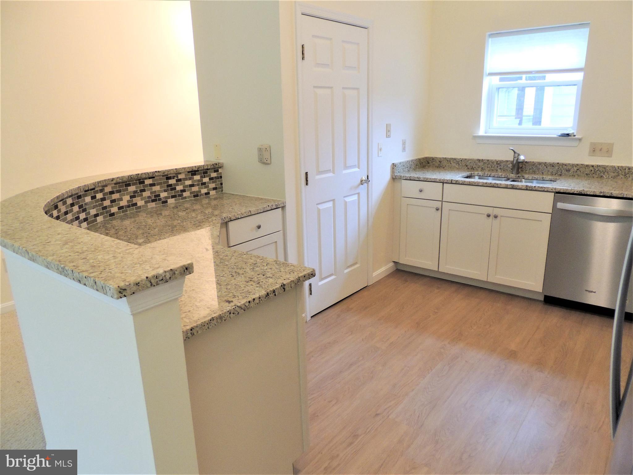 136 Square Rigger Way Solomons, MD 20688 - Photo 4 of 36 Granite counters and large pantry