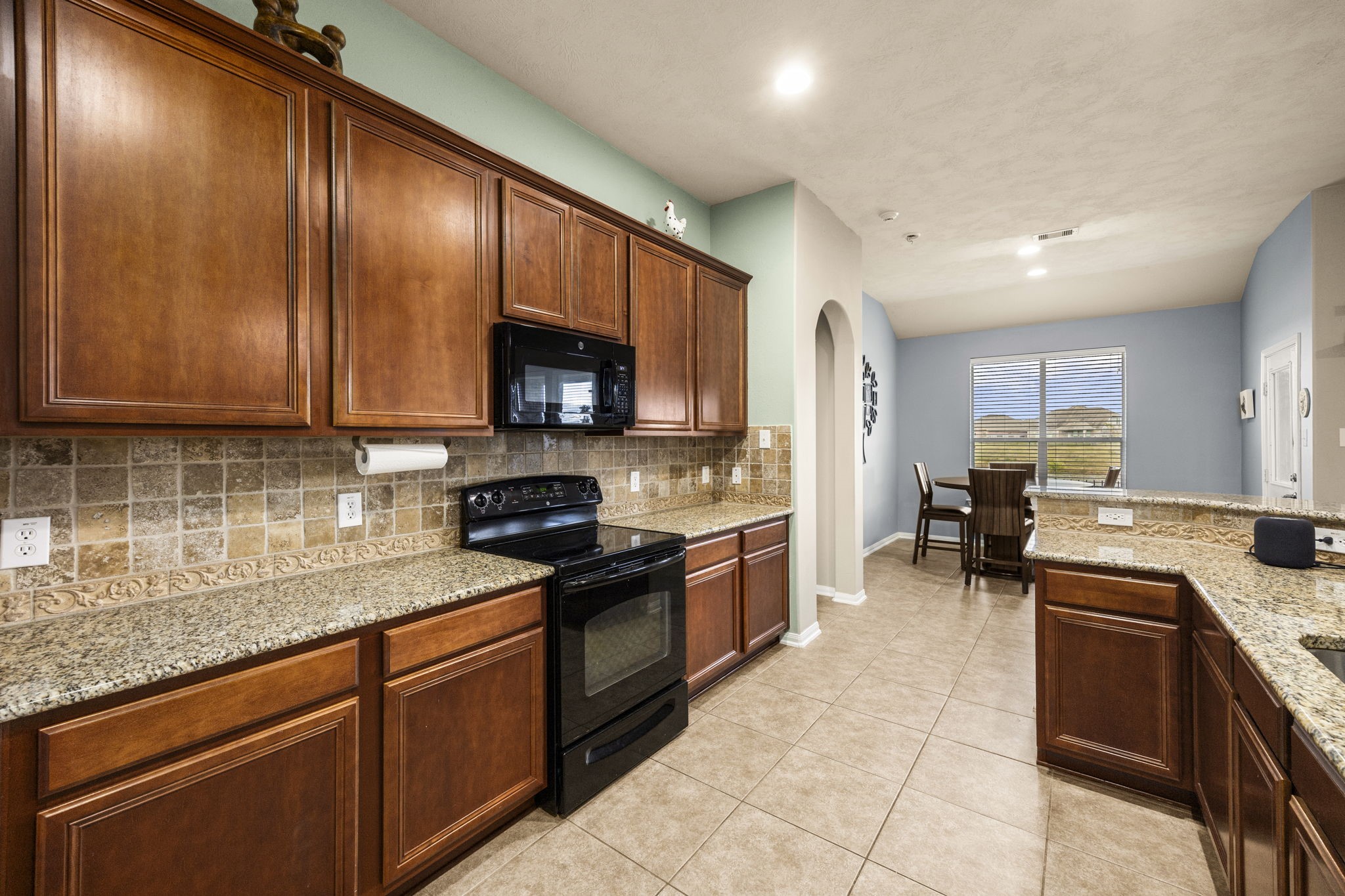2202 Winchester Lake Rosenberg, TX 77471 - Photo 16 of 31 Looking out from the kitchen to the breakfast room.