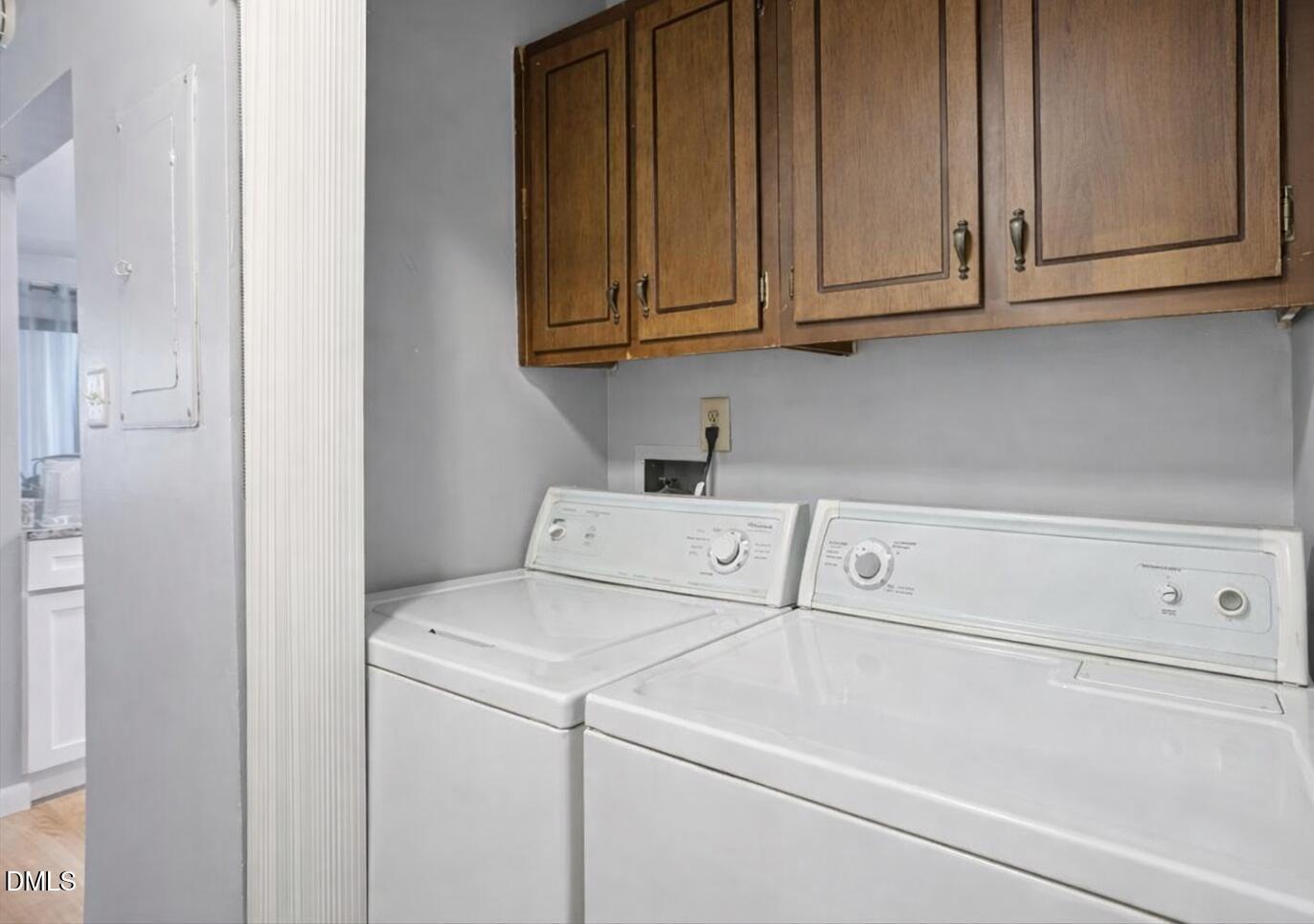 5130 Flint Ridge Place Raleigh, NC 27609 - Photo 15 of 22 a utility room with dryer and washer