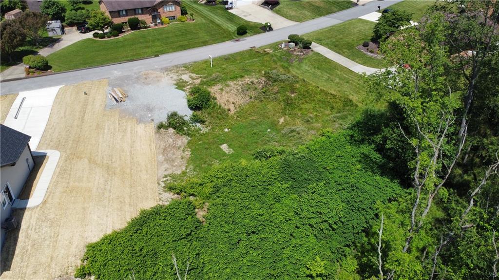 Lot 8 Timbercrest Circle Cecil, PA 15321 - Photo 3 of 5 an aerial view of a house with a yard and garden