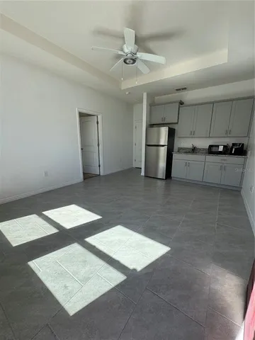 a view of a kitchen with a sink