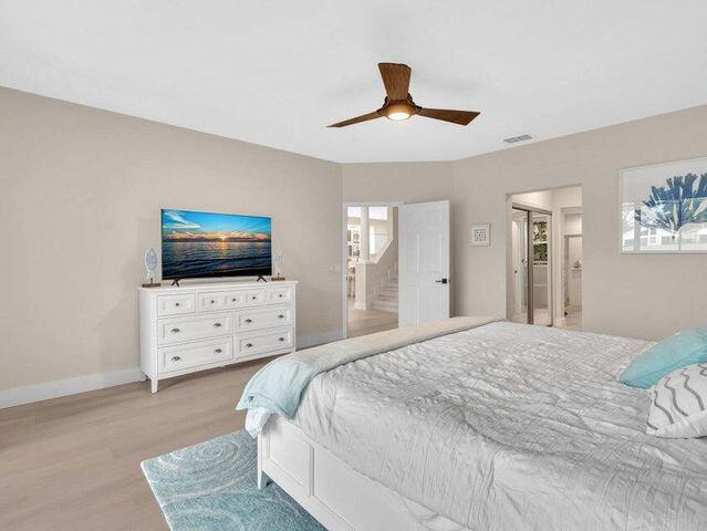 2237 Northwest 53rd Street Boca Raton, FL 33496 - Photo 28 of 76 a living room with furniture and a flat screen tv