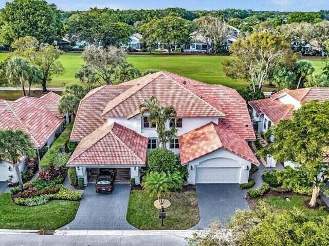 2237 Northwest 53rd Street Boca Raton, FL 33496 - Photo 63 of 76 an aerial view of a house with garden space and a patio