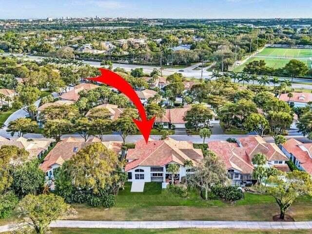 2237 Northwest 53rd Street Boca Raton, FL 33496 - Photo 73 of 76 an aerial view of residential houses with outdoor space and trees