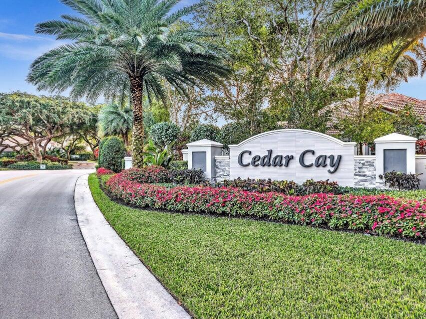 2237 Northwest 53rd Street Boca Raton, FL 33496 - Photo 76 of 76 a front view of multi story residential apartment building with yard and sign board